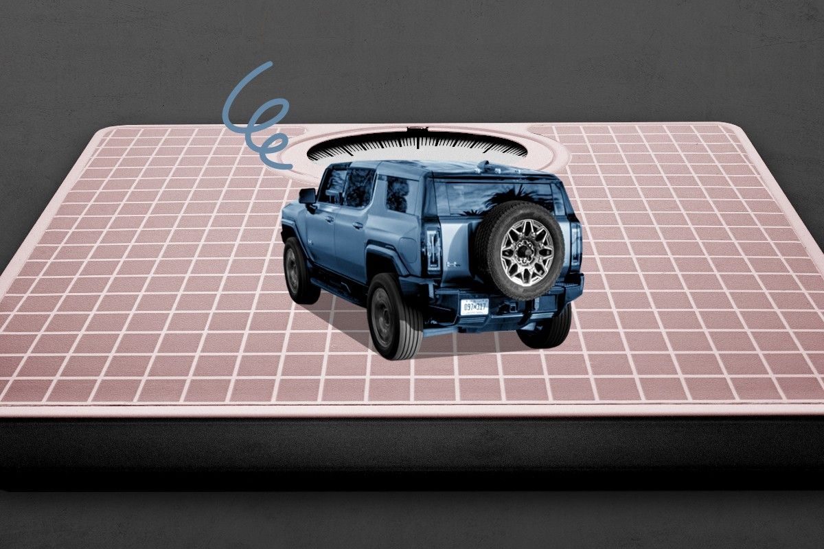 A Hummer EV on a scale.