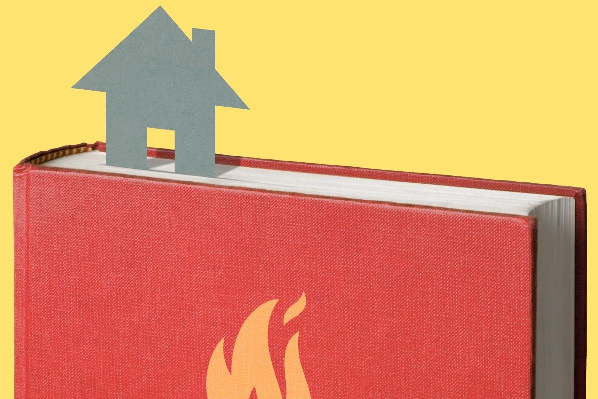 A book with a house bookmark.