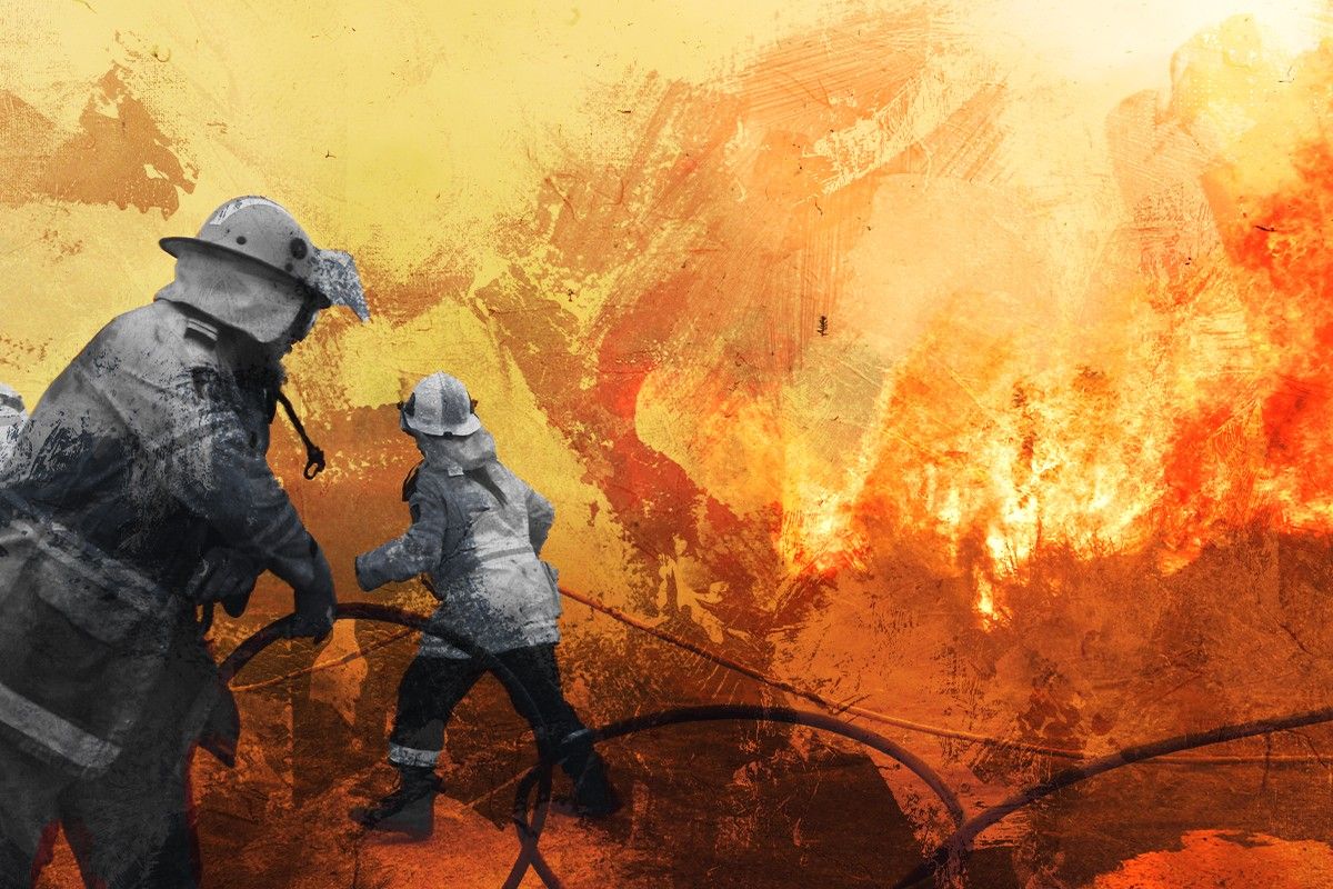 People fighting a wildfire.