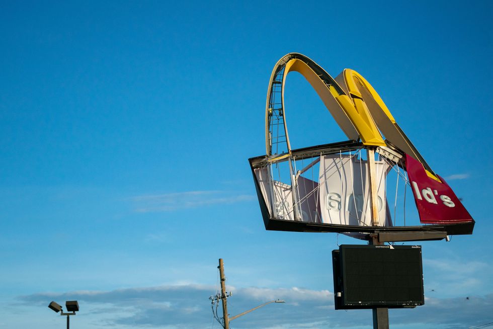 A storm-damaged McDonald's sign.