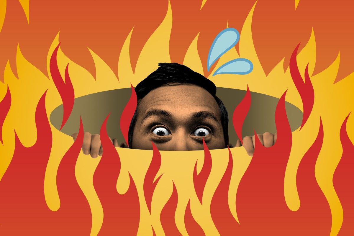 A man hiding from a wildfire.