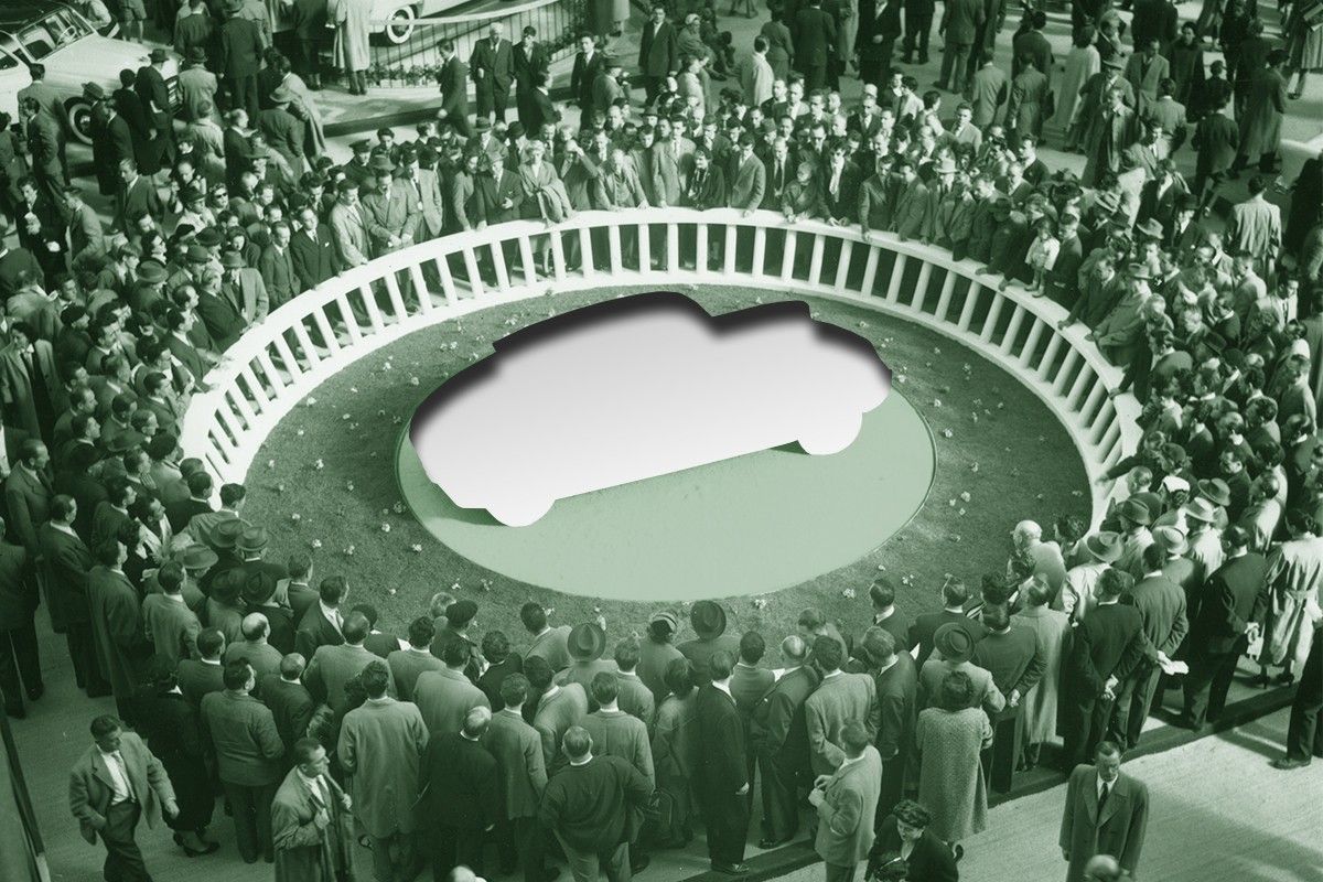 A car missing from an auto show display.